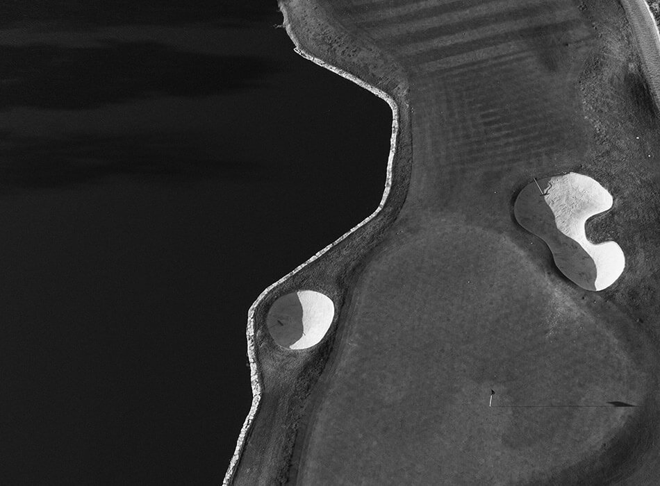 black and white image of the golf course